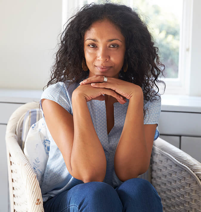 woman smiling slightly