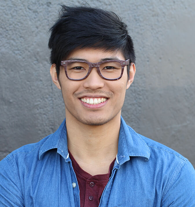 young man with a bright, white smile