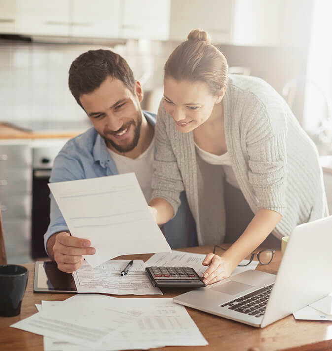 couple looking over paperwork together