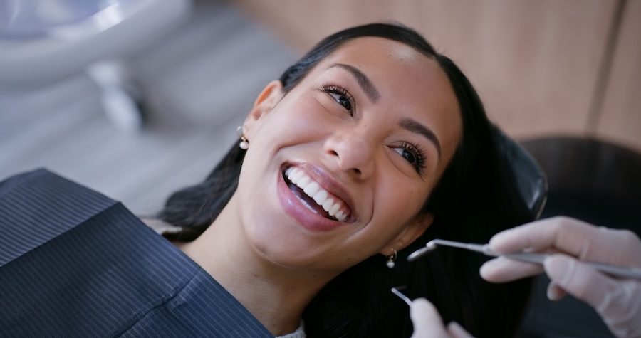 woman in dental chair at a community focused dentist